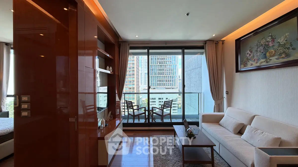 Modern living room with balcony view in high-rise apartment