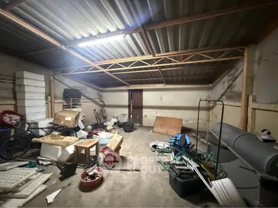 Spacious storage room with ample potential for organization and utility.