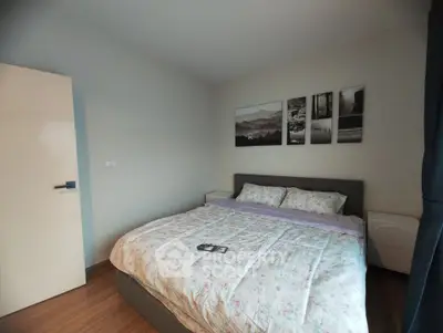 Cozy bedroom with modern decor and comfortable bedding
