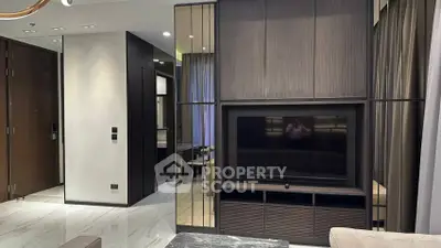 Modern living room with sleek TV unit and elegant decor