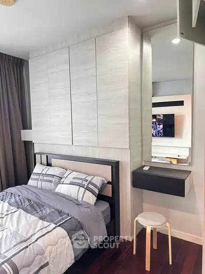 Modern bedroom with stylish decor and built-in storage solutions