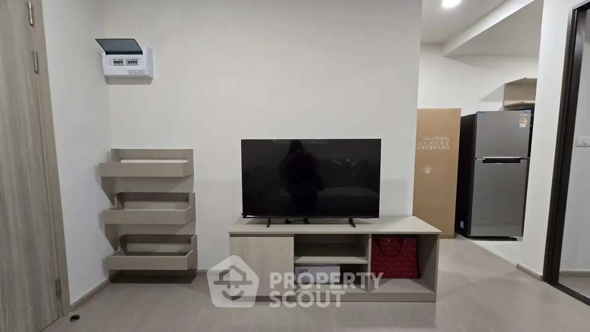 Modern living room with sleek TV stand and contemporary decor