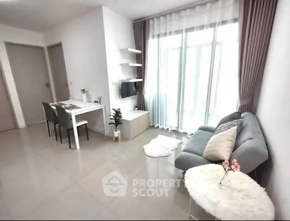 Modern living room with sleek furniture and natural light