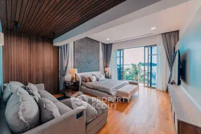 Luxurious bedroom with stunning ocean view and modern decor