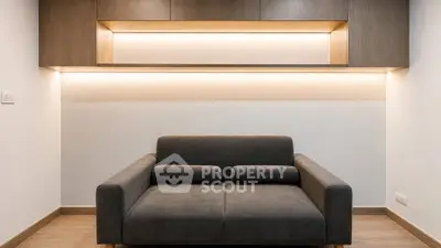 Modern living room with sleek sofa and ambient lighting