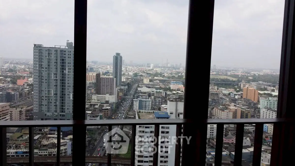Stunning cityscape view from high-rise apartment balcony