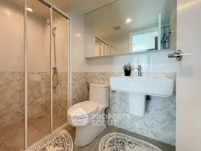 Modern bathroom with sleek design and spacious shower area