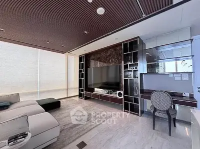 Luxurious modern living room with sleek design and large TV unit