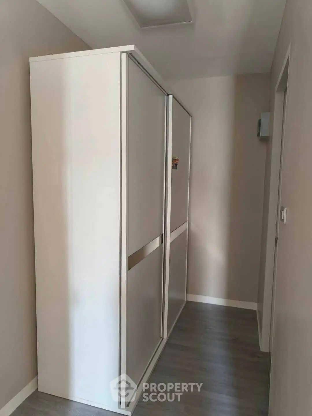 Modern hallway with sleek storage unit and minimalist design