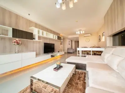 Spacious modern living room with elegant decor and ample natural light