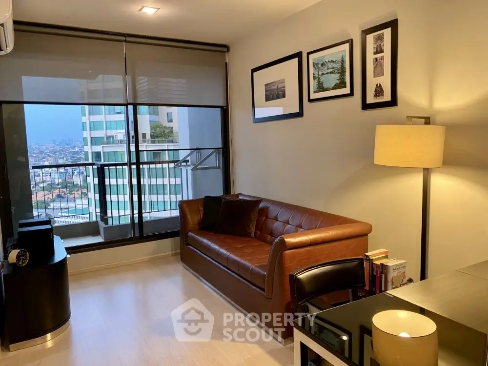 Modern living room with leather sofa and city view balcony