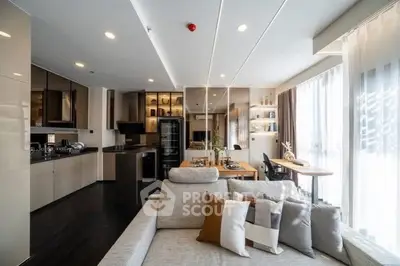Spacious modern living room with open kitchen and large windows