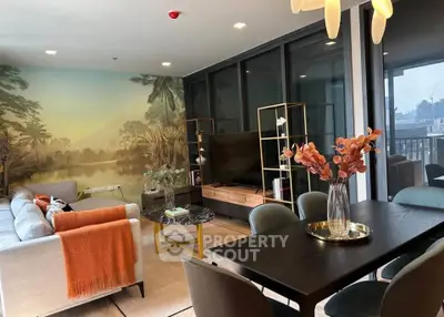 Luxurious living room with modern decor and stunning city view, perfect for urban living.