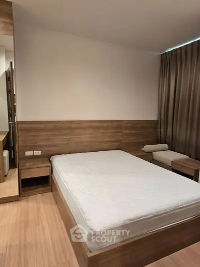 Modern bedroom with wooden furniture and cozy ambiance