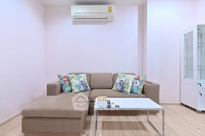 Modern living room with stylish sofa and air conditioning