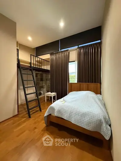 Modern bedroom with loft bed and cozy wooden flooring
