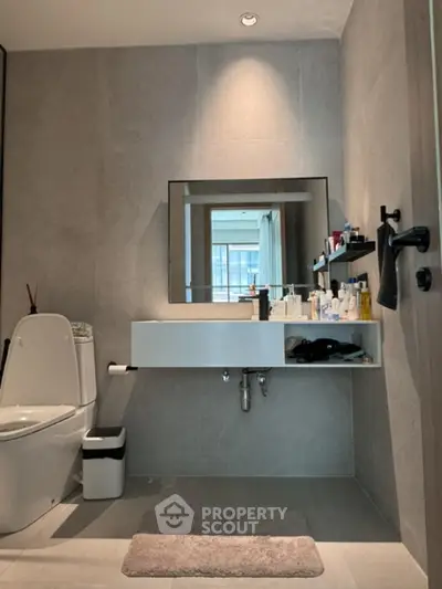 Modern bathroom with sleek fixtures and ample storage space