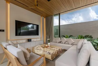 Luxurious modern living room with large windows and stylish wooden furniture.