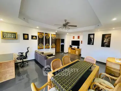 Spacious living room with modern decor and stylish furniture, perfect for relaxation and entertainment.