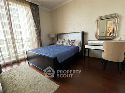 Elegant bedroom with stylish decor and natural light in modern apartment