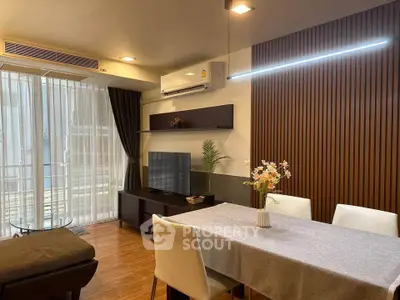 Modern living room with elegant dining area and stylish decor