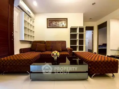 Spacious living room with modern furniture and elegant decor