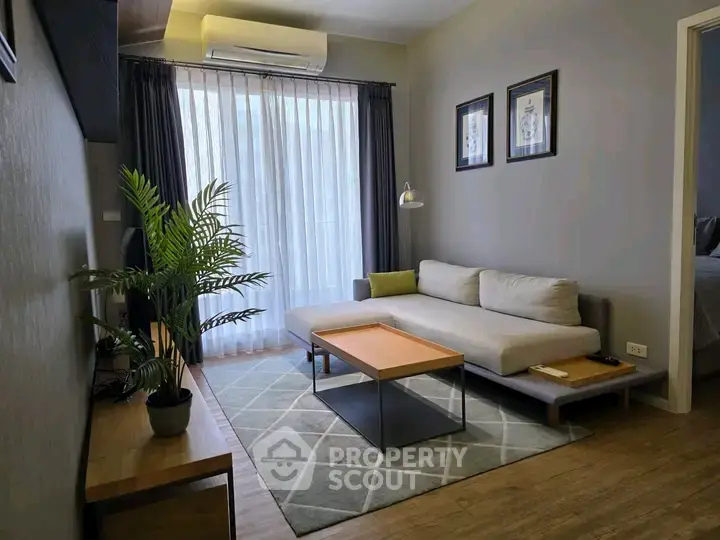 Modern living room with stylish decor and natural light