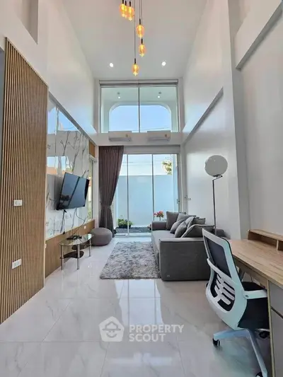 Stunning modern living room with high ceilings and elegant decor
