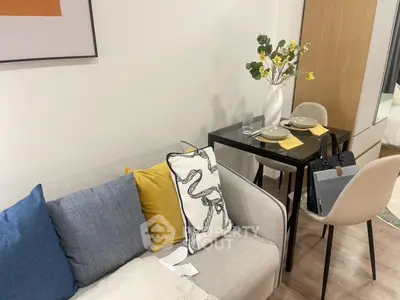 Modern living room with stylish decor and cozy dining area