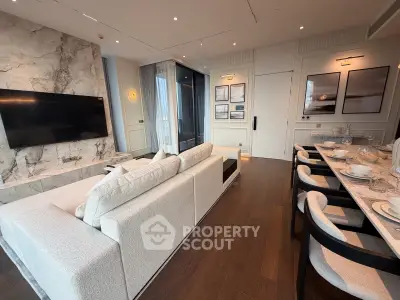 Luxurious modern living room with elegant dining area and marble accents
