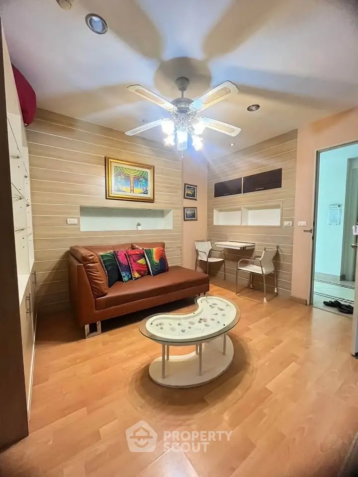 Cozy living room with modern decor and stylish furniture, perfect for relaxation.