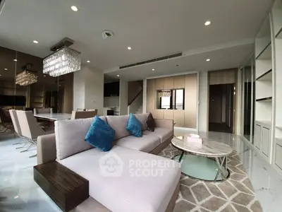 Luxurious open-plan living room with elegant decor and modern furniture