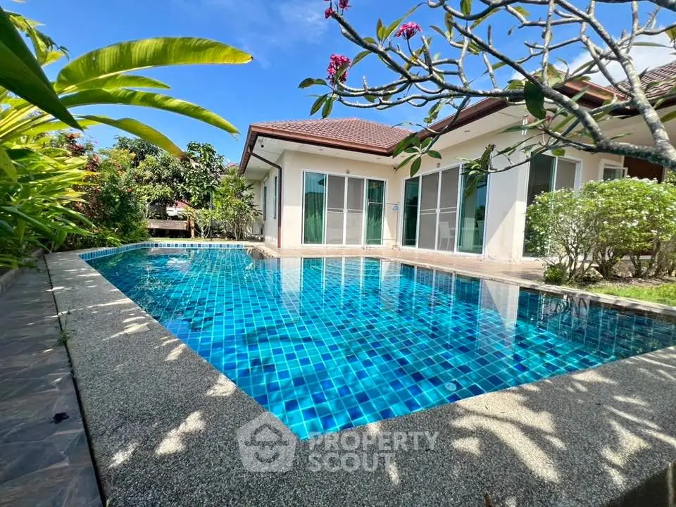 Luxurious villa with private pool and lush garden, perfect for serene living.