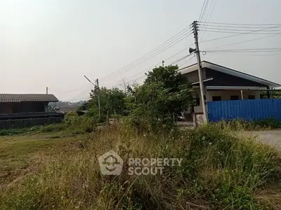 Charming rural property with lush greenery and a cozy home, perfect for tranquil living.