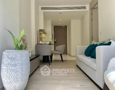 Modern living room with stylish decor and open kitchen layout