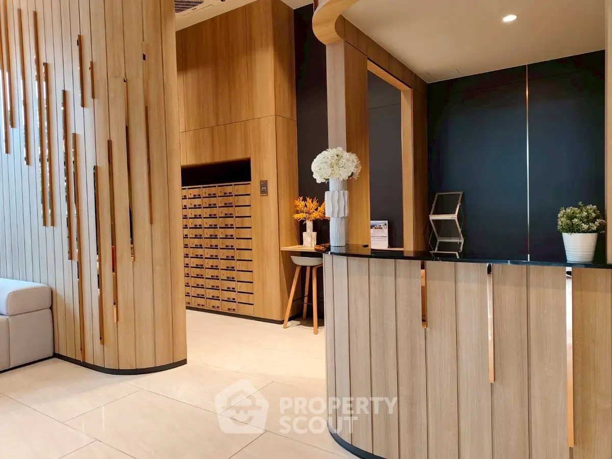 Elegant modern lobby with wooden paneling and sleek design elements