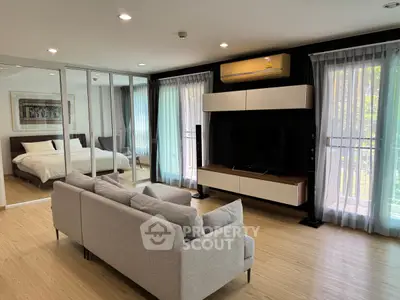 Spacious modern living room with sleek design and natural light