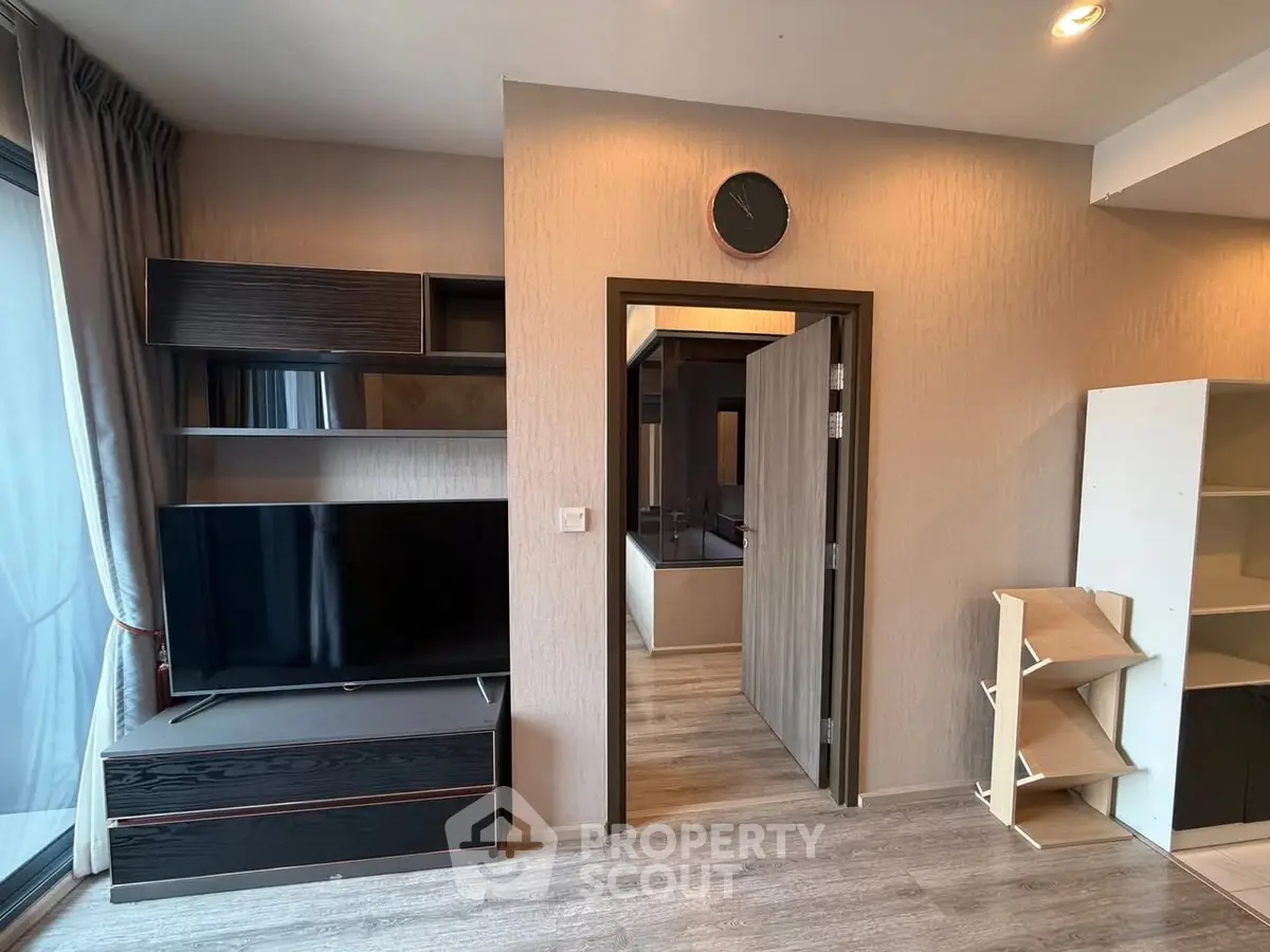 Modern living room with sleek TV unit and stylish decor