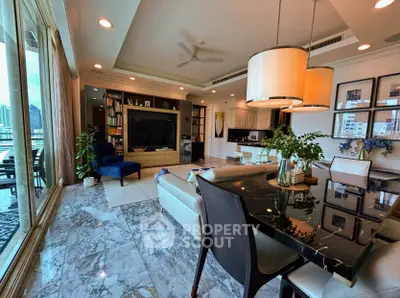 Luxurious living room with marble floors, modern furniture, and city view from large windows.