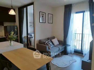 Modern living room with balcony view and stylish decor