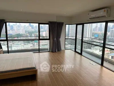 Spacious corner unit with panoramic city views and modern design.