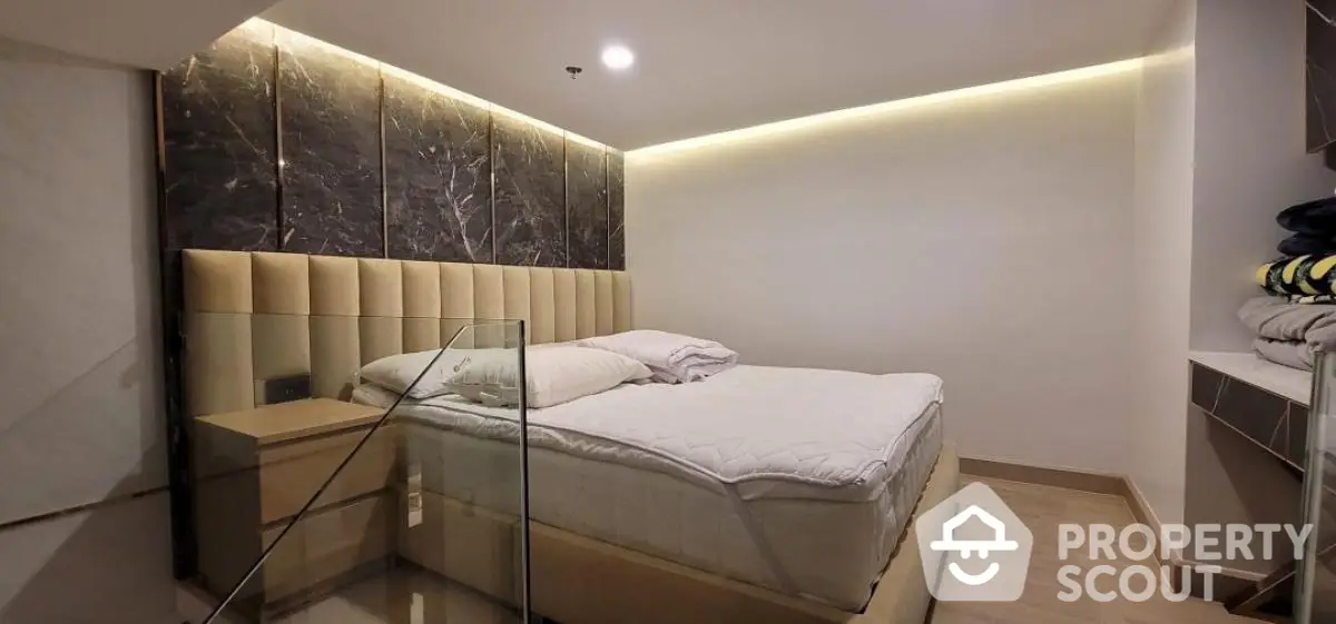 Luxurious bedroom with modern design and ambient lighting