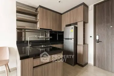 Modern kitchen with sleek cabinetry and stainless steel appliances