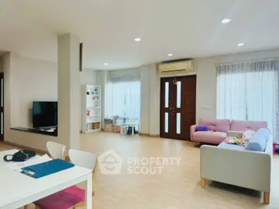 Spacious modern living room with natural light and stylish decor