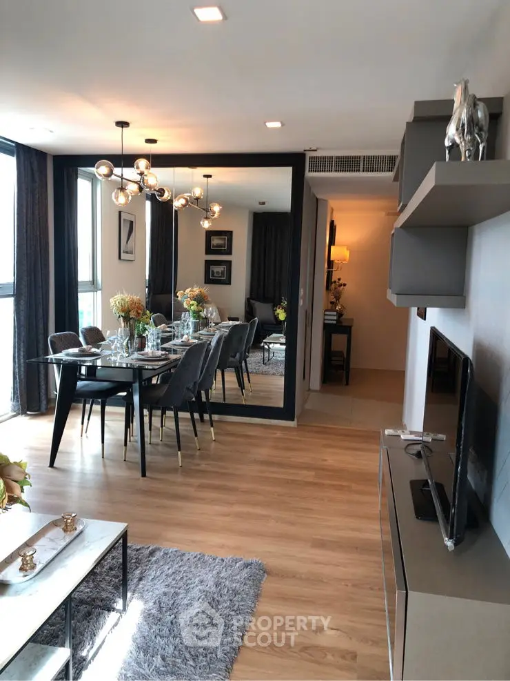 Modern living room with elegant dining area and stylish decor