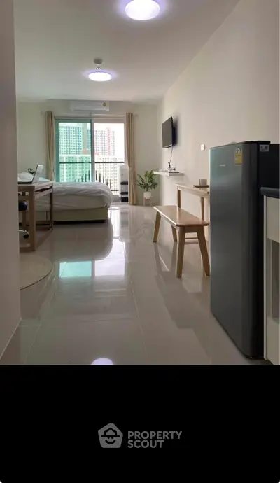 Modern studio apartment with sleek design and natural light