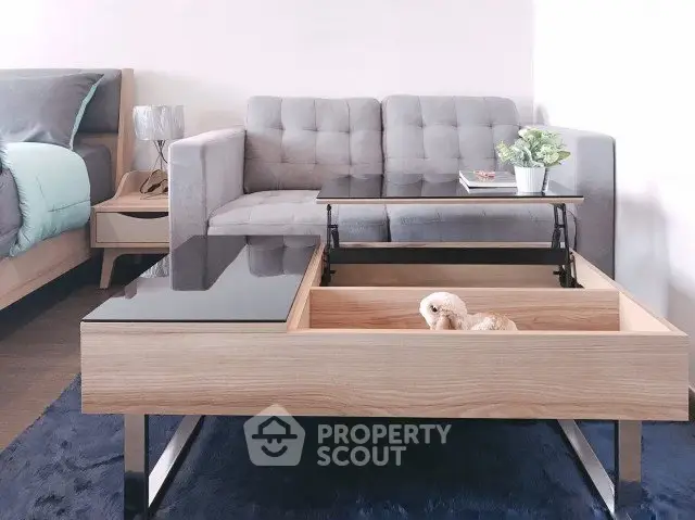 Modern living room with stylish sofa and multifunctional coffee table