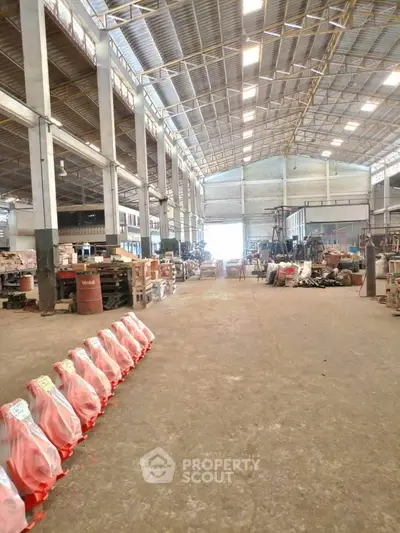 Spacious industrial warehouse with high ceilings and ample storage space
