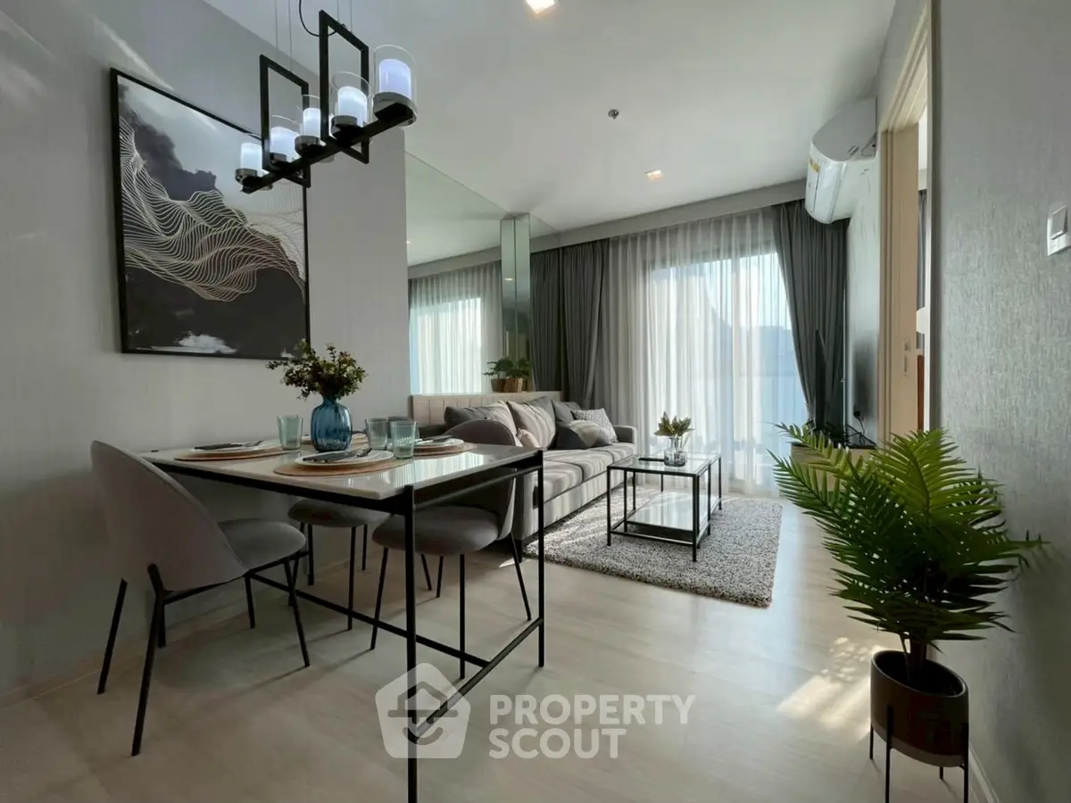 Modern living room with elegant dining area and stylish decor