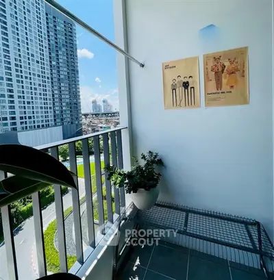 Charming balcony with city view in modern high-rise apartment